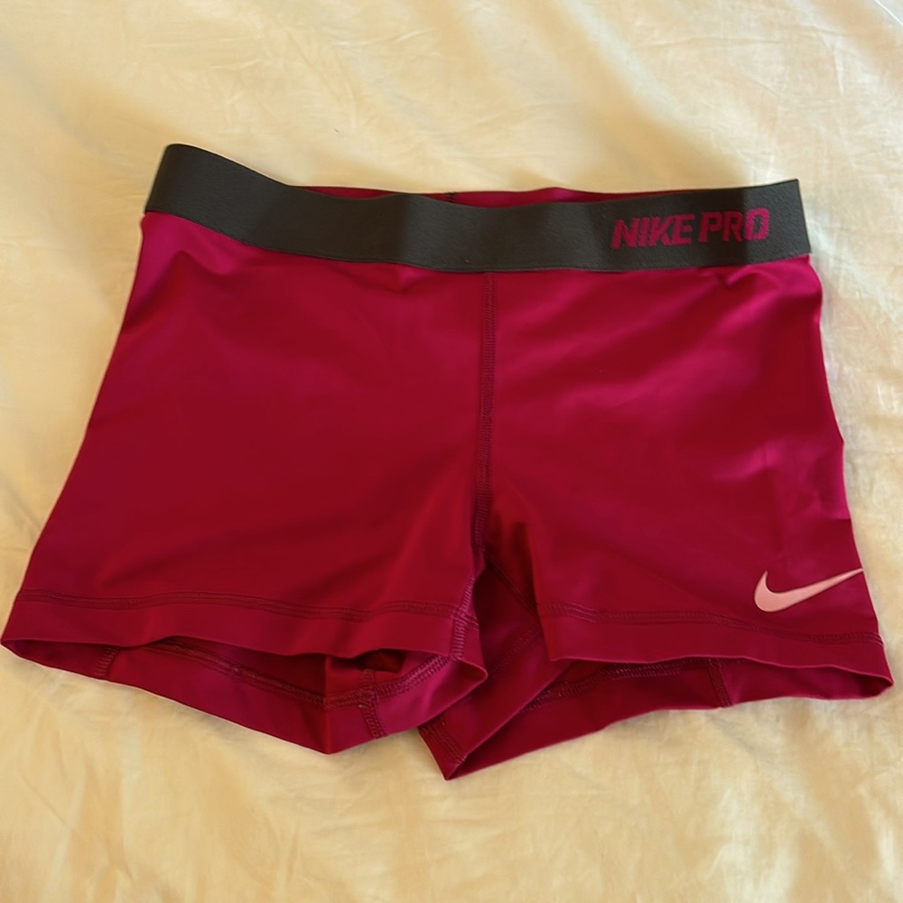 Women’s pink Nike pros shorts.